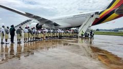 Uganda Martyrs students boarding a flight to Dubai