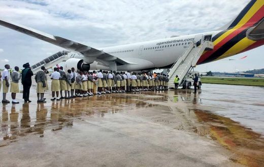 Uganda Martyrs students boarding a flight to Dubai