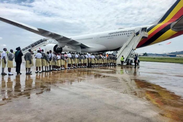 Uganda Martyrs students boarding a flight to Dubai