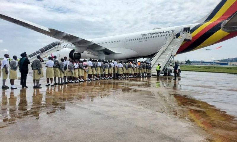 Uganda Martyrs students boarding a flight to Dubai