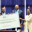 Minister Chris Baryomunsi handed over the license to CBS officials
