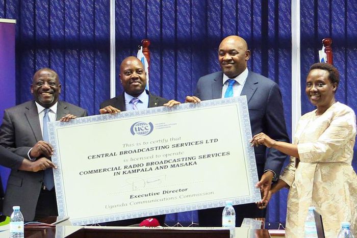 Minister Chris Baryomunsi handed over the license to CBS officials