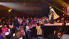 Jose Chameleone pictured on stage as fans cheer on