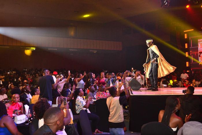Jose Chameleone pictured on stage as fans cheer on