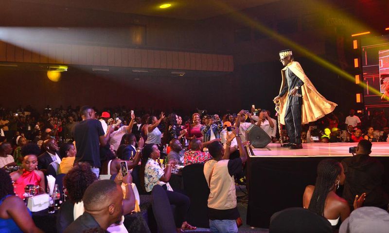 Jose Chameleone pictured on stage as fans cheer on