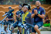 Dr Stephen Rwangezi performs at an event