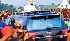 A rear view of Museveni's car showing what appears to be a camera or censor mounted on the back window
