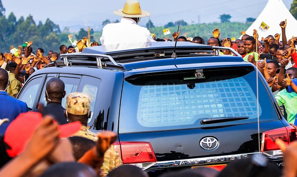 A rear view of Museveni's car showing what appears to be a camera or censor mounted on the back window