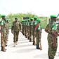 Lt. Gen. Sam Kavuma was accorded a guard of honour by UPDF troops at the ATMIS headquarters