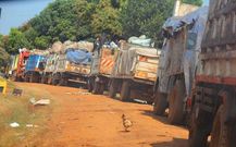 Trucks line up to dump garbage in Nkumba