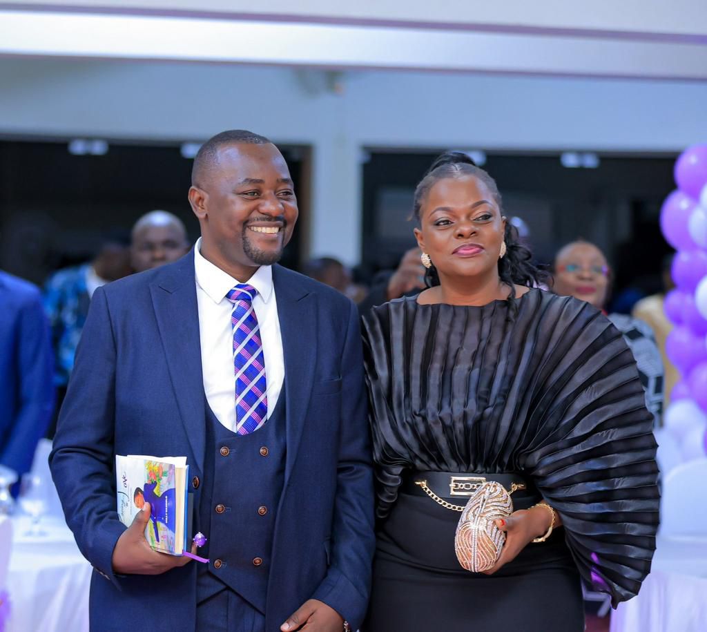 Milly Nassolo with her husband at the launch