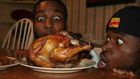 ___7856575___2018___1___17___13___Black-men-eating-chicken