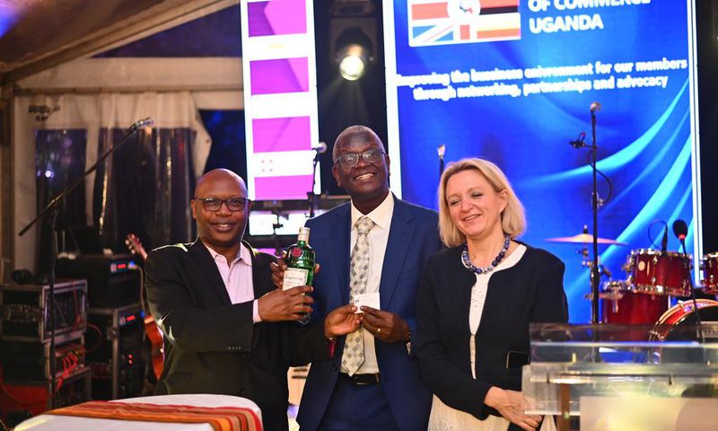(L-R) Allan Mugisha the Executive Director Ernst and Young, Andrew Kilonzo the Uganda Breweries Managing Director and the British High Commissioner Kate Airey at the launch of the British Chamber of Commerce Uganda