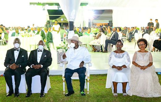 Museveni poses for a photo with Atwiine and her husband