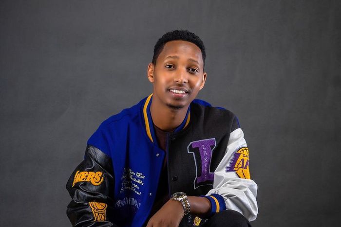 Israel Mbonyi in a Lakers jacket, the Rwandan gospel artiste is an avid reader and basketball fan