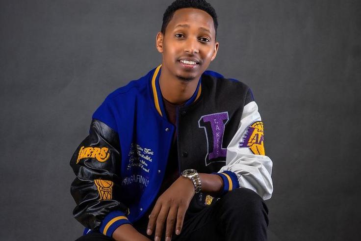 Israel Mbonyi in a Lakers jacket, the Rwandan gospel artiste is an avid reader and basketball fan