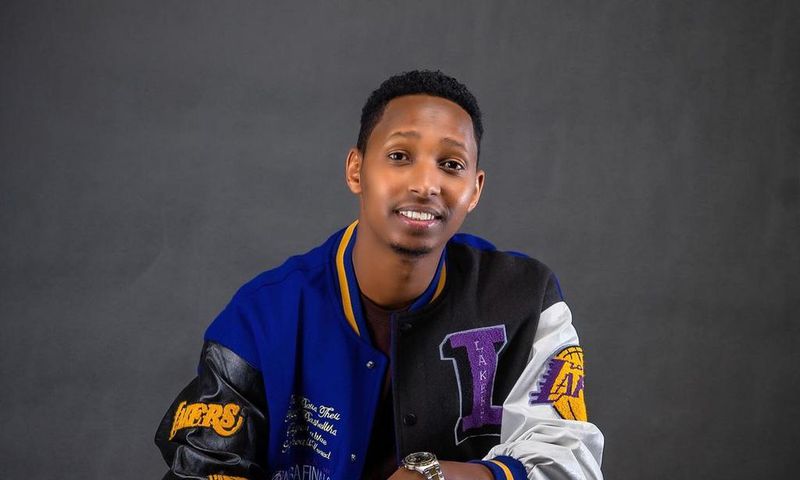 Israel Mbonyi in a Lakers jacket, the Rwandan gospel artiste is an avid reader and basketball fan