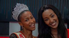 Natasha Nyonyozi poses with the outgoing Miss Uganda Hannah Karema