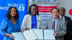 Minister Lillian Aber with Japanese Ambassador to Uganda, Sakayama Takuya and Paulina Chiwangu, the UN Women countyr Rep at the signing