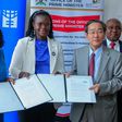 Minister Lillian Aber with Japanese Ambassador to Uganda, Sakayama Takuya and Paulina Chiwangu, the UN Women countyr Rep at the signing