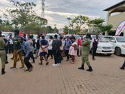 A police officer making the announcement