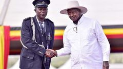 Musa Walugembe with President Yoweri Museveni