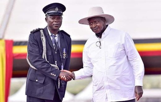 Musa Walugembe with President Yoweri Museveni