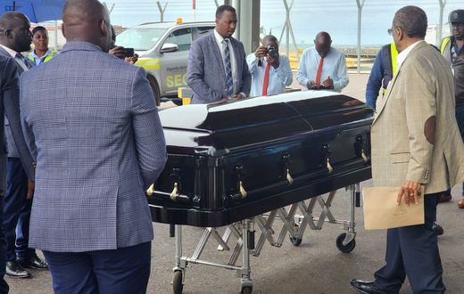 Casket carrying Babu's remains