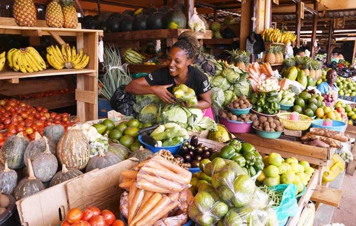A Ugandan woman at her business