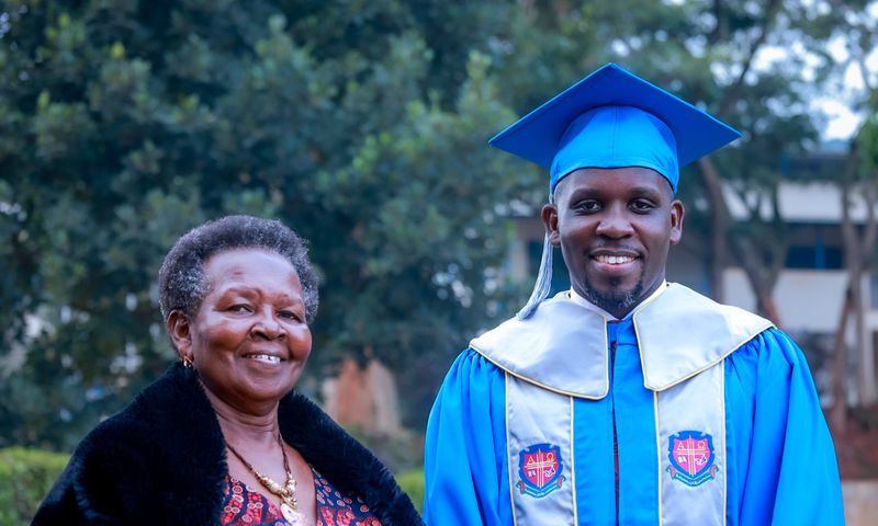 Joel Ssenyonyi with his mother