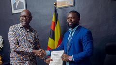 Bernard Feni, the Director of Euro Gold with a representative from Mubende artisanal miners during the MOU signing