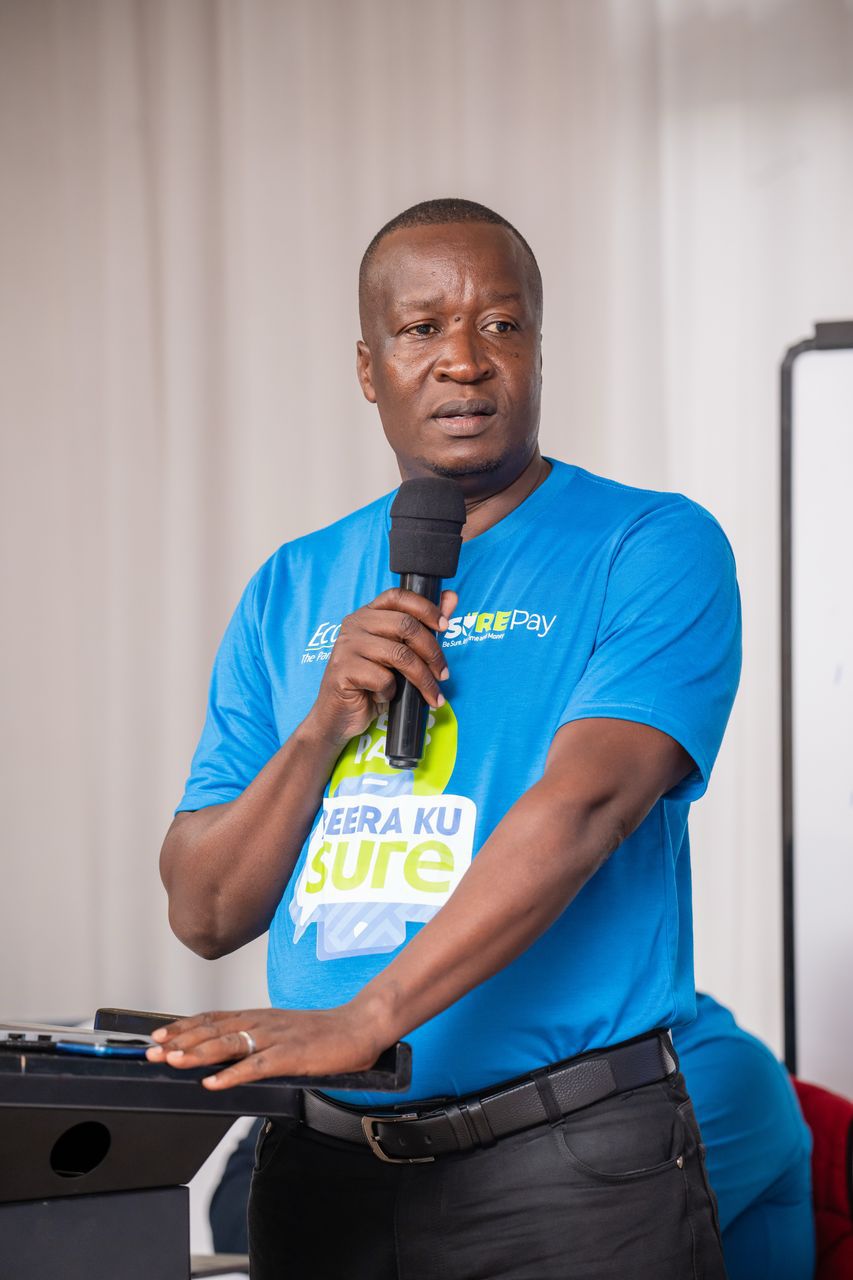 Moses Okiror CEO SurePay addressing the stakeholders.