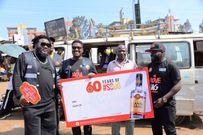 Celebrating the taxi community in Nakawa market as part of the SO UG SO 60 campaign 60 boda boda procession with Uganda Waragi