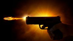 Image of a gun being fired