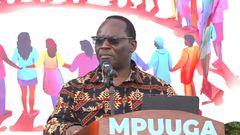 Mathias Mpuuga speaking at the launch
