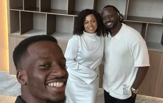 Alpha Ssali with his parents