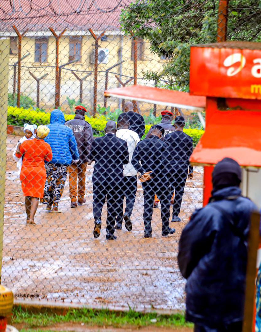 Bobi Wine and LOP Joel Ssenyonyi with Eddy Mutwe's mother Jane Natumbwe at Masaka Central Prison