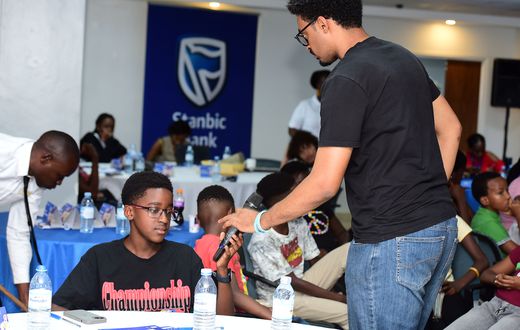 One of the facilitators interacting with some of the attendees