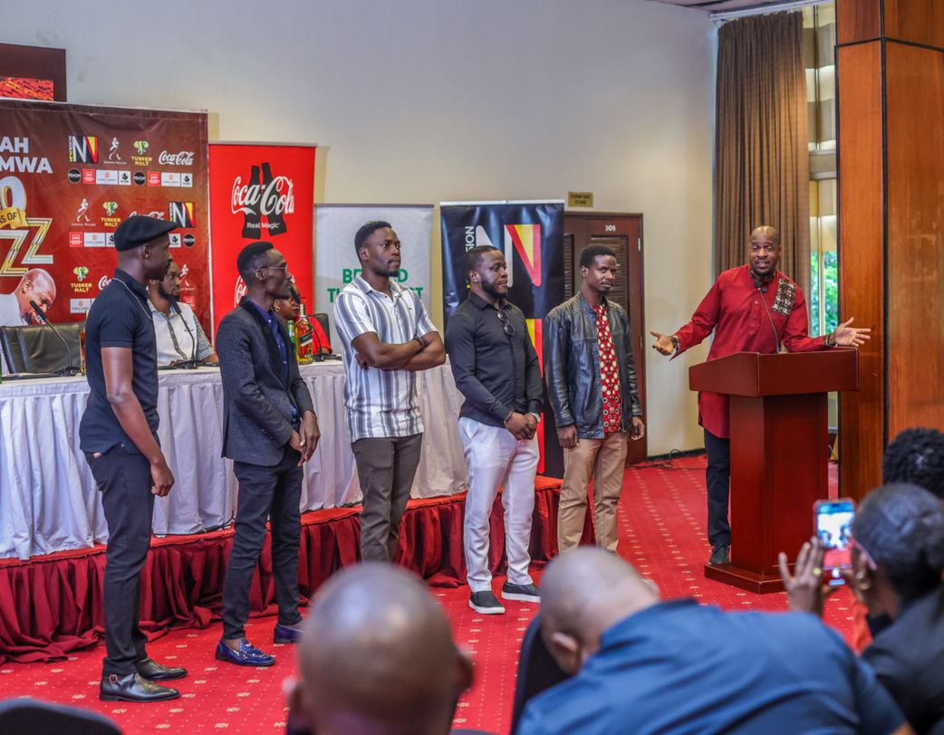 Isaiah Katumwa with some of his mentees