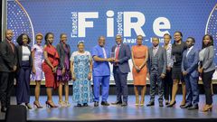 Peter Ssenyange (C), the Chief Financial Officer at Pearl Bank, receiving the Banking Services General Banking Award from John Bosco Ntangaare(7th L), Consultant at the World Bank and ICPAU's former Director of Education.