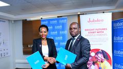 Jubilee Health Insurance CEO, Dan Musiime with Grace Muliisa, Managing Director of Ecobank Uganda