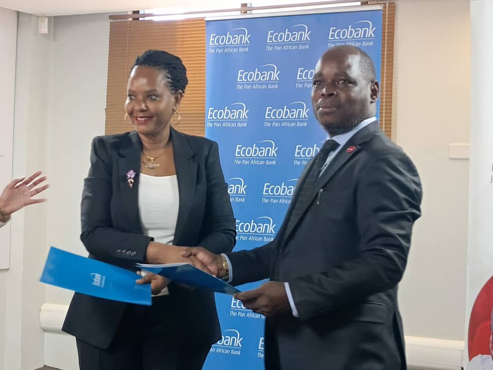 Jubilee Health Insurance CEO, Dan Musiime with Grace Muliisa, Managing Director of Ecobank Uganda
