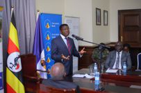 Pater Mayiga speaking at the handover