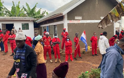 NUP security guards the house where Muhammad Ssegirinya's body was (Bukedde photo)