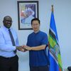 PS  Vincent Bagiire Waiswa poses for a hand shake photo with Ambassador Zhang Lizhong the Ambassador of China to Uganda