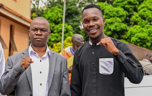 Alex Luwemba with the late Muhammad Ssegirinya