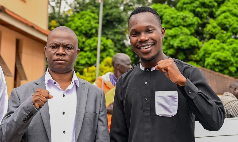 Alex Luwemba with the late Muhammad Ssegirinya