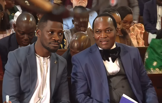 Bobi Wine chats with Mathias Mpuuga at Kabaka's birthday servce
