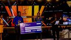 Emma Illungole (L) and Kefa Senoga (R) recieving the Award on behalf of Brian Kabogozza and Douglas Byaruhanga
