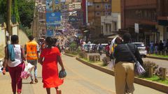 Pedestrians walk on the Kampala’s non-motorized transport corridor. Photo by Richard Hamba/ TEENS Uganda